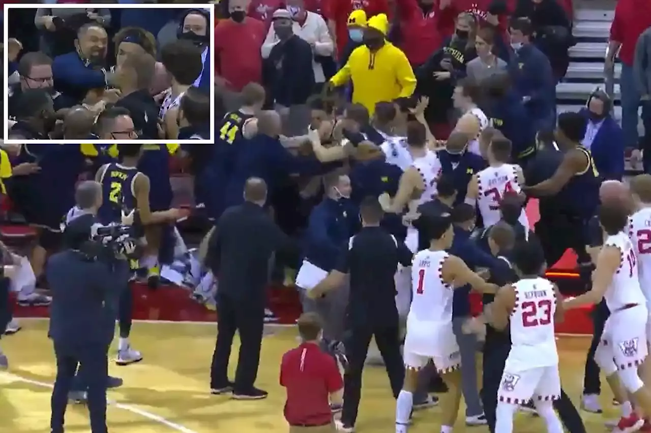 Juwan Howard swing sparks wild Michigan-Wisconsin basketball brawl