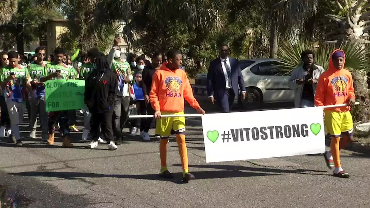 Dozens ‘blow the whistle’ as they march in honor of 11-year-old hurt in hit-and-run