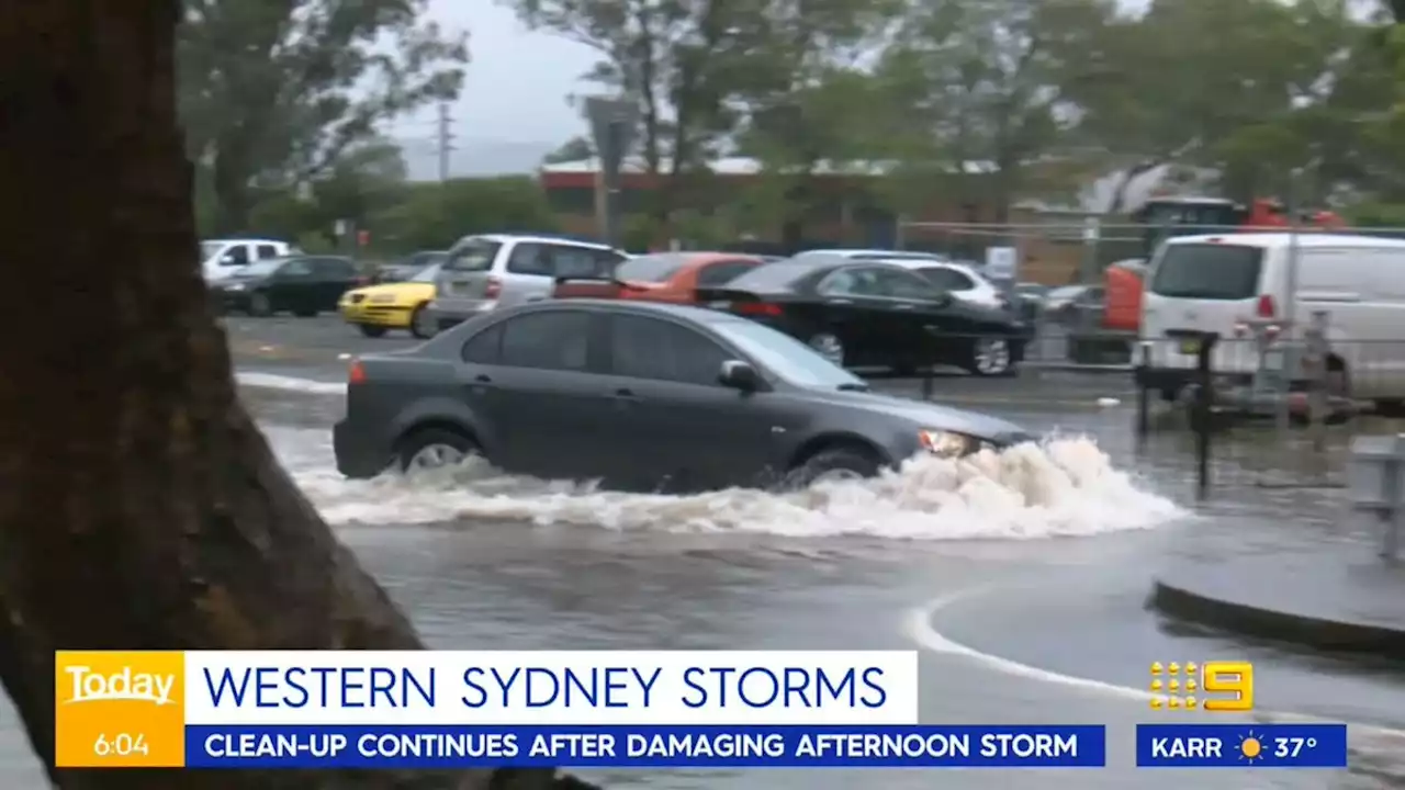 House destroyed after suspected lightning strike, as wild storm lashes Sydney