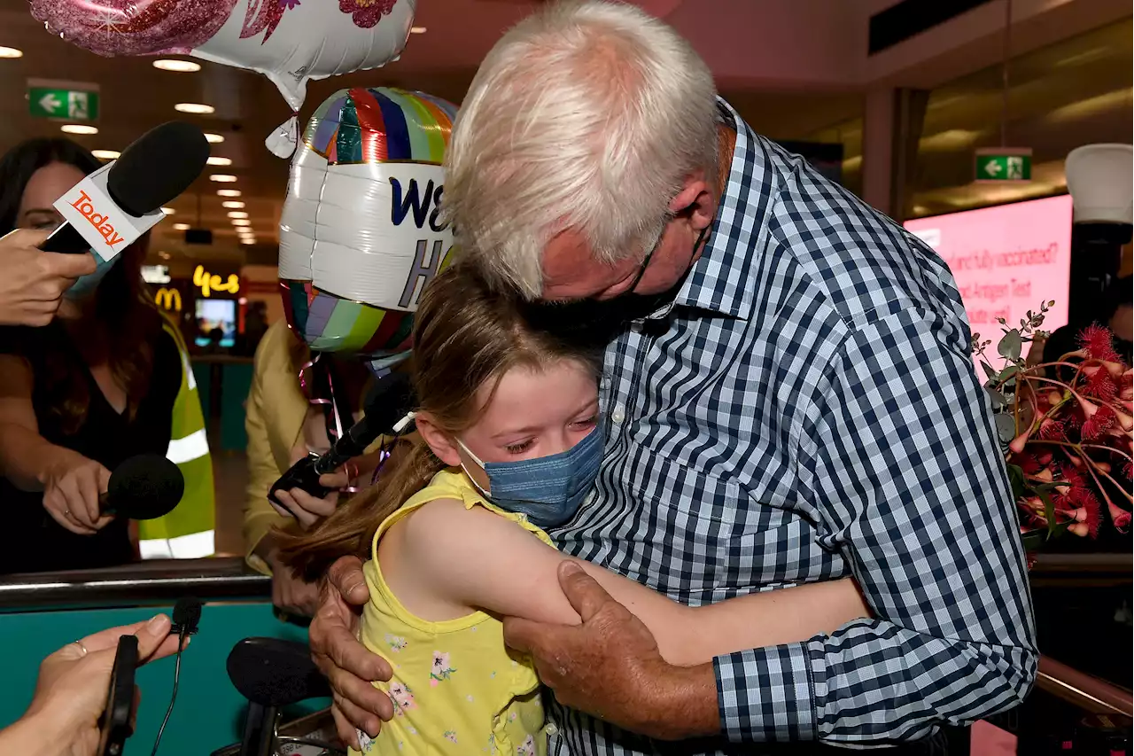 Tourists Finally Welcomed Back to Australia With Toy Koalas, Tim Tams, Hugs