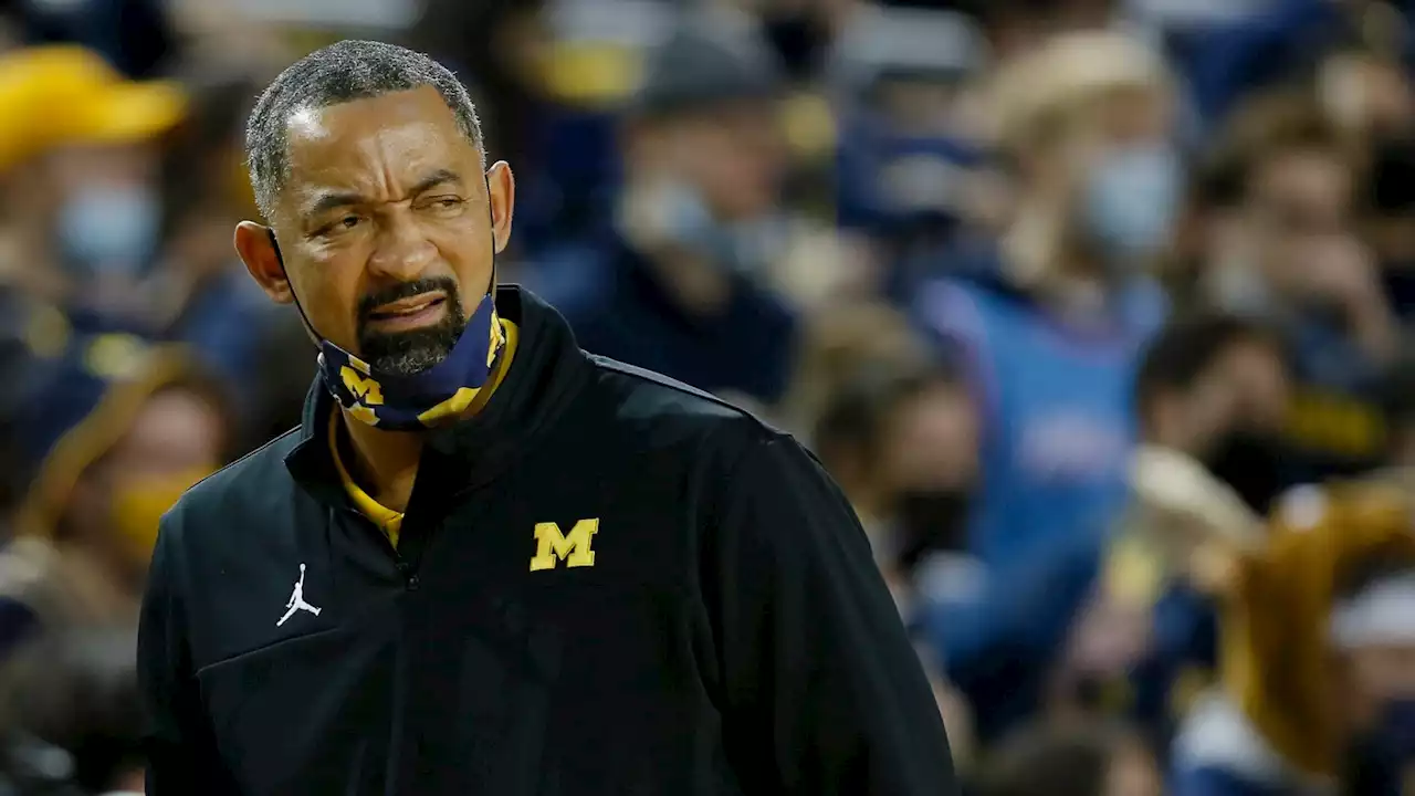 Michigan’s Juwan Howard throws punch at Wisconsin assistant, sparking postgame melee