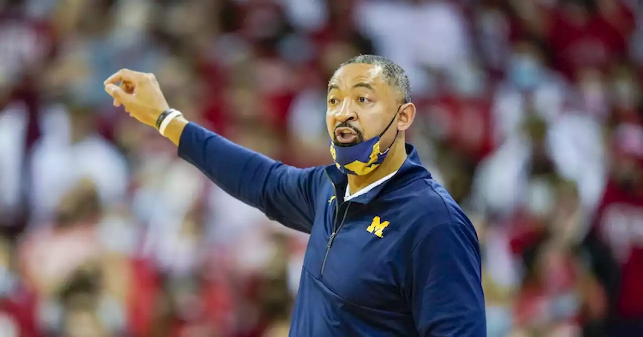 Michigan coach Howard hits Wisconsin assistant after 77-63 loss