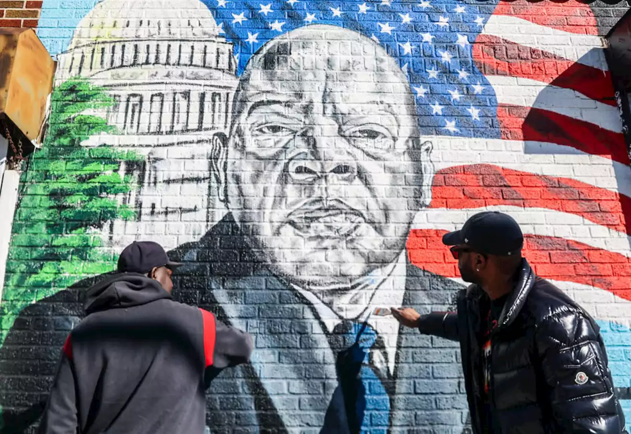 Artist, East Flatbush community celebrates John Lewis’ birthday with new mural | amNewYork