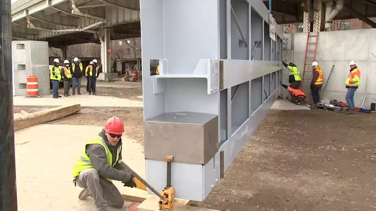 Massive 32-ton floodgate lifted into place on Lower East Side to protect area from coastal flooding