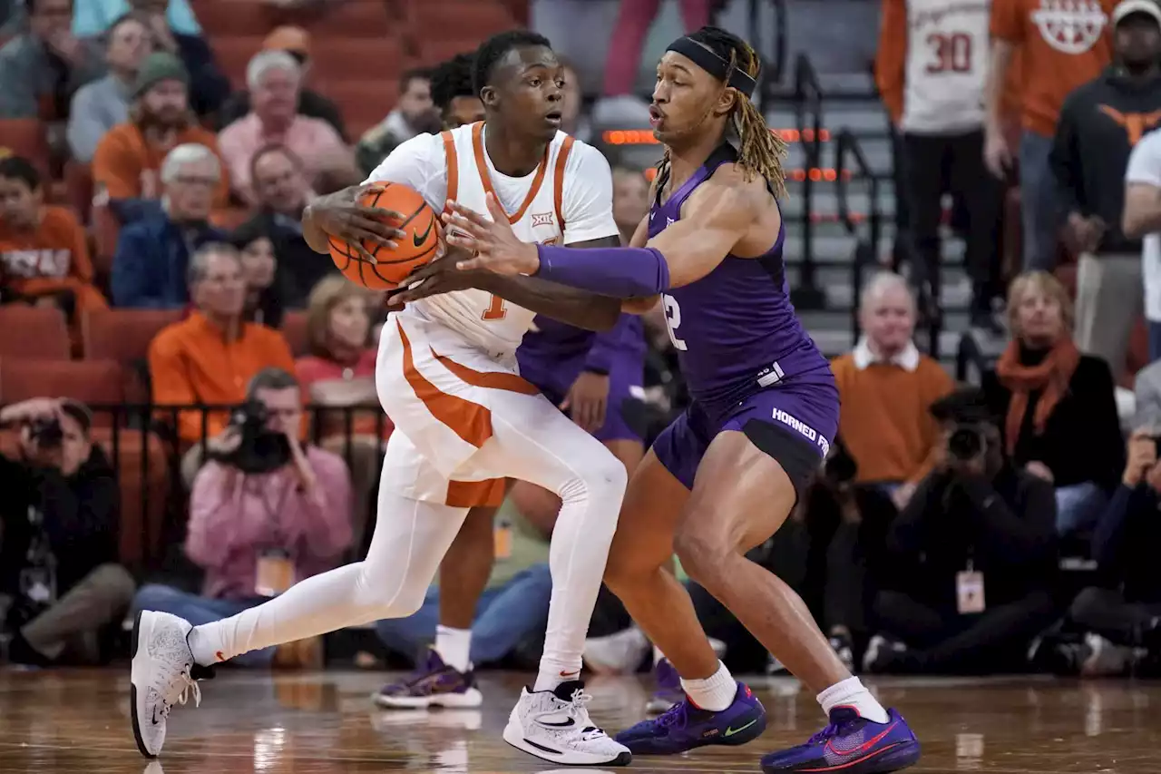 Texas comes up with all answers late to hold off TCU