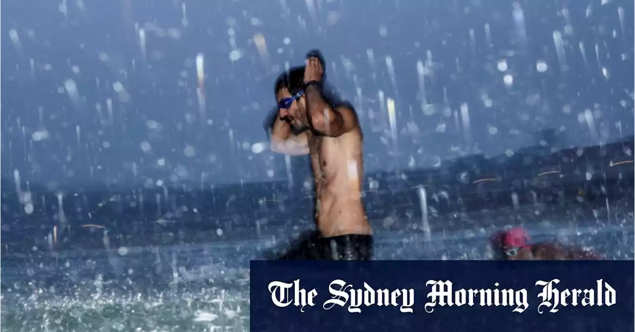 Flood warnings issued as downpours forecast in Sydney and northern NSW