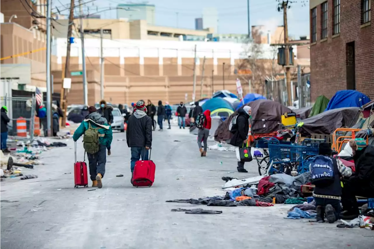 Tents are gone from Boston encampment, but dozens still congregate in the area