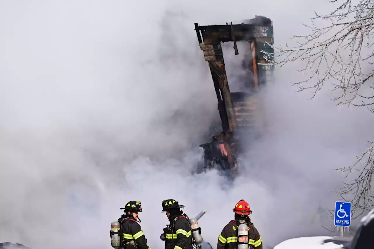 Firefighters douse fire at Westminster complex where explosion occurred two days earlier