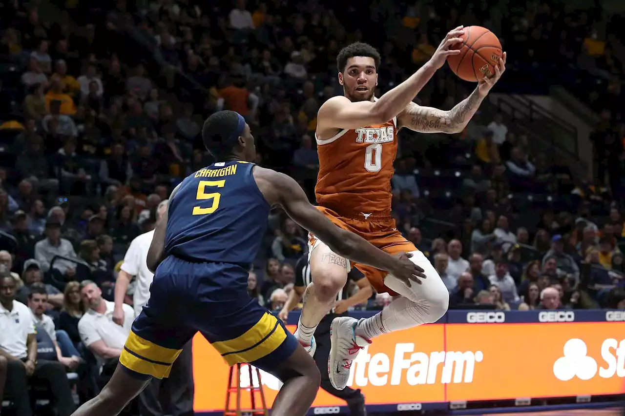 Texas rallies to win chippy affair in West Virginia