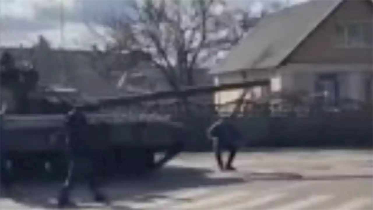 Ukrainian man squares up with Russian tank as invasion continues