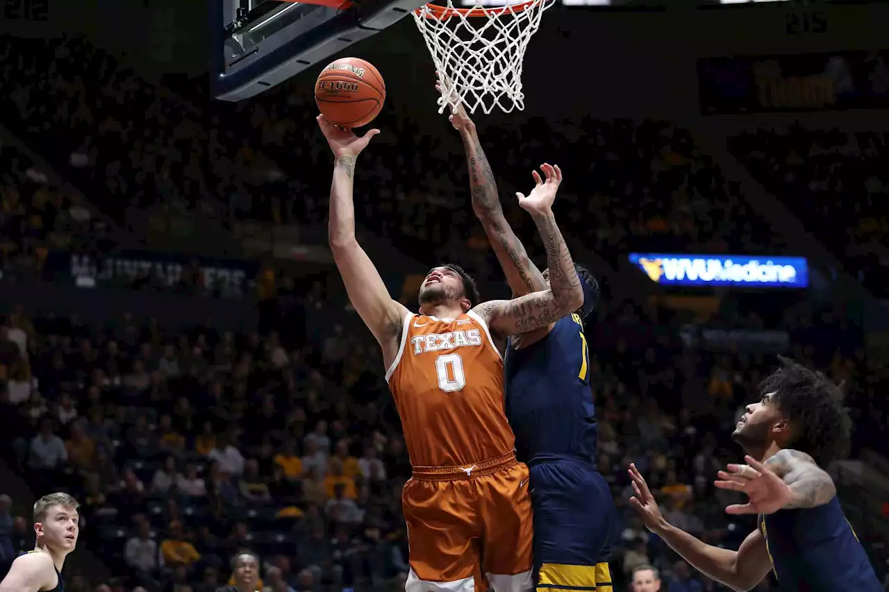 Texas roars back to edge West Virginia on road