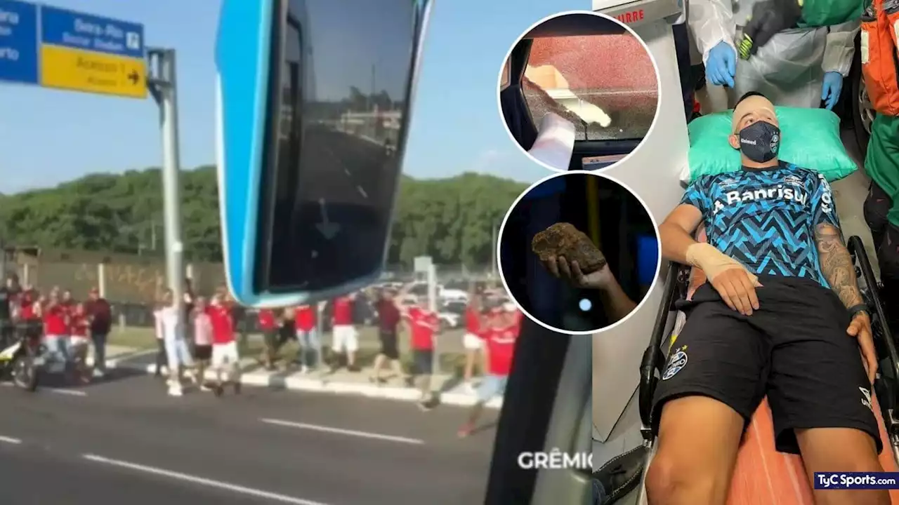 (VIDEO) Brutal ataque al micro del Gremio: un jugador herido por un piedrazo - TyC Sports