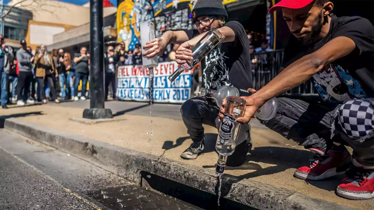 Las Vegas bar owner and patrons pour Russian vodka down the drain in show of support for Ukraine