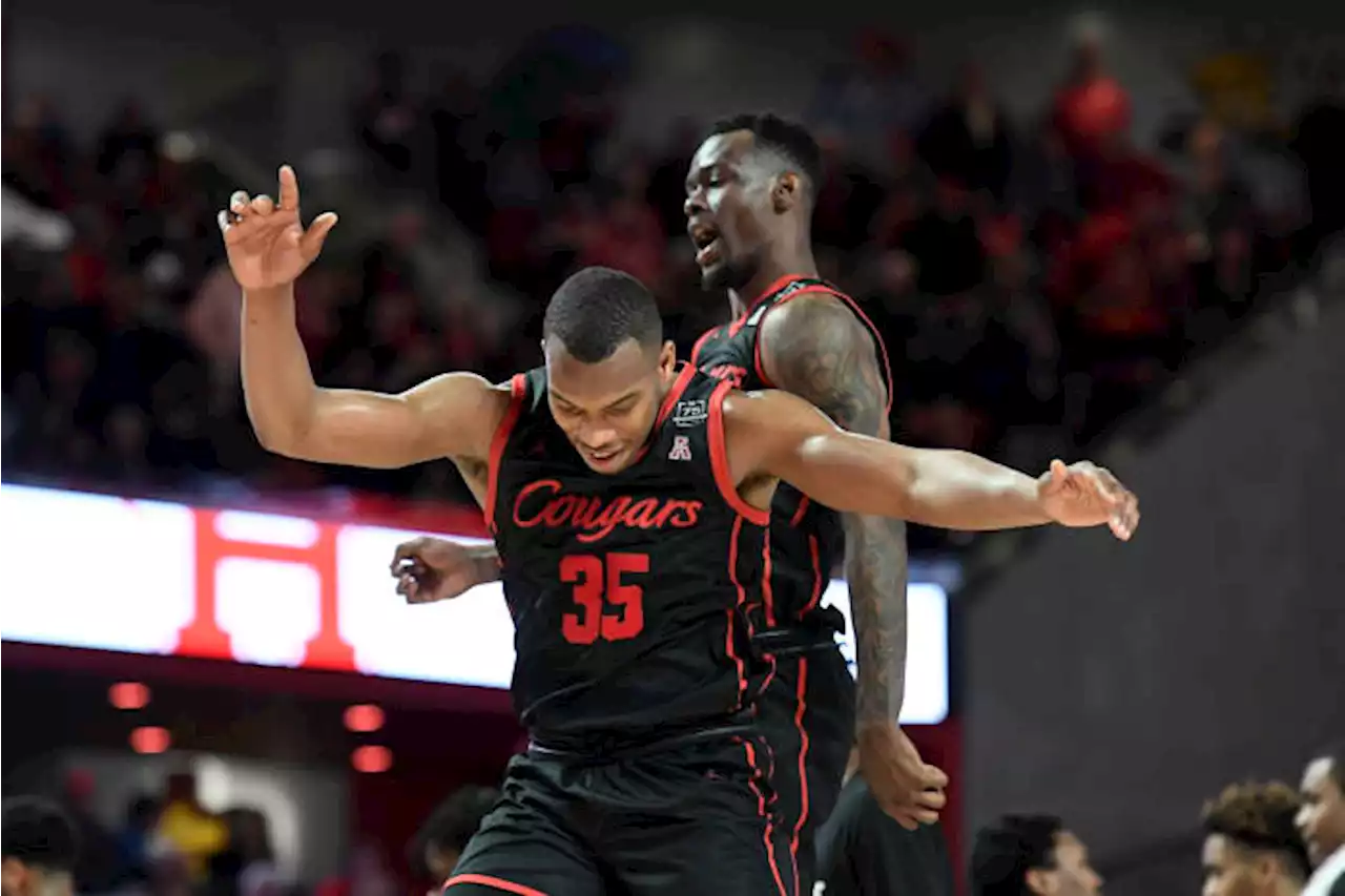 White scores 21, No. 14 Houston beats SMU 75-61