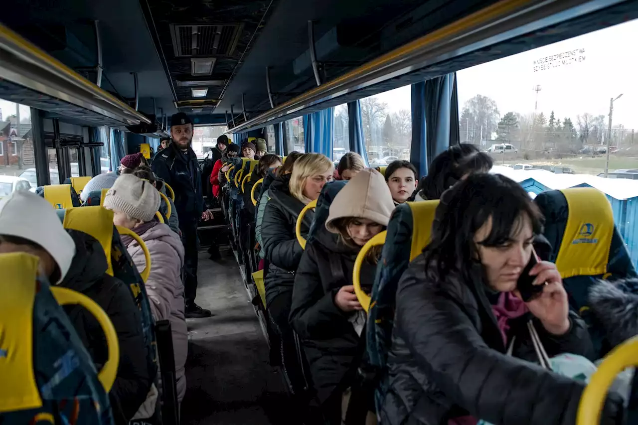 Miles-long lines, the kindness of strangers, an uncertain future: Scenes from the Ukraine-Poland border