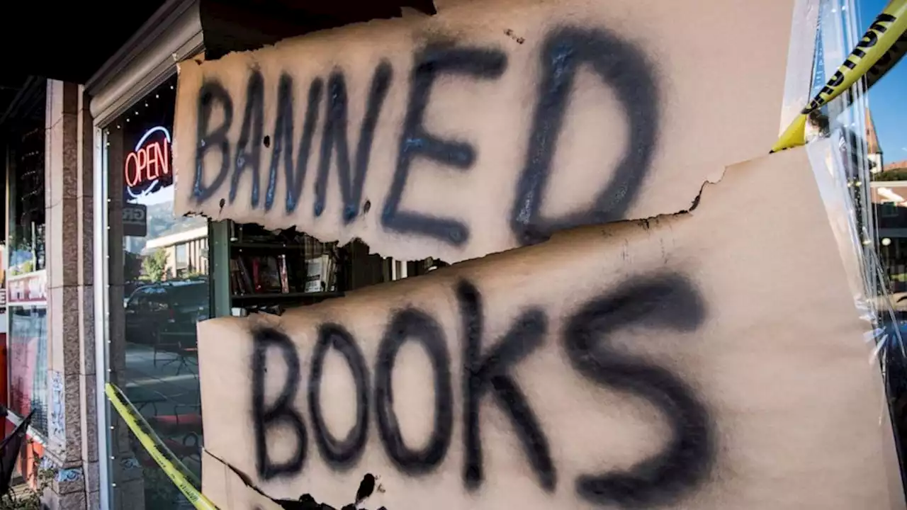 Students protest book bans by distributing 'Maus,' 'Beloved'