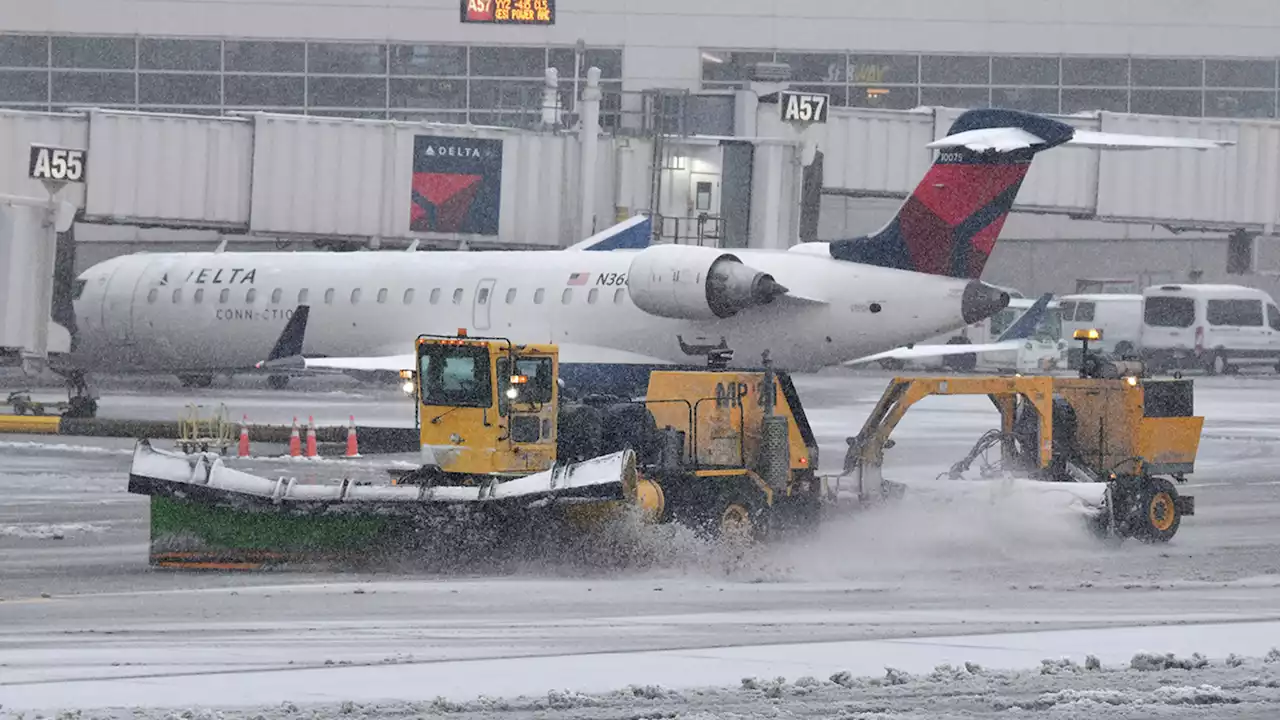 US sees year's biggest day of flight cancellations as massive winter storm tears through country