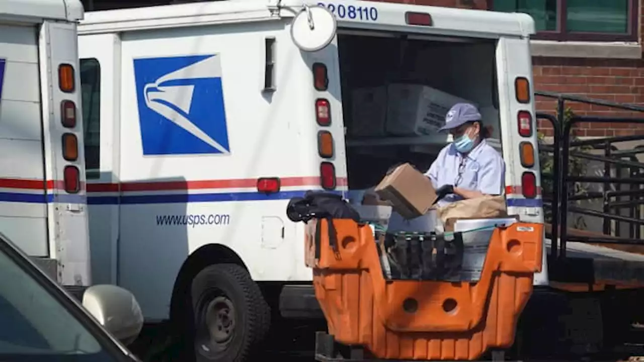 Biden administration urges against U.S. Postal Service plan to spend billions on gas vehicles