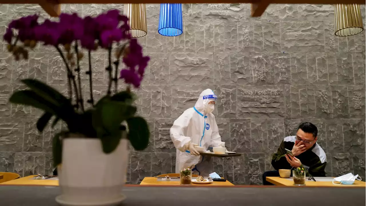 Bartenders in Beijing Olympics Bubble Are Serving Drinks in Hazmat Suits