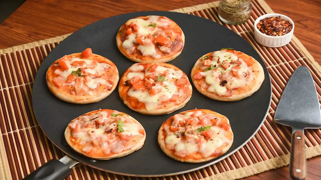 Tawa Pizza Recipe: बिना अवन के घर पर बनाएं तवा पिज्जा, जानें इंस्टेंट रेसिपी