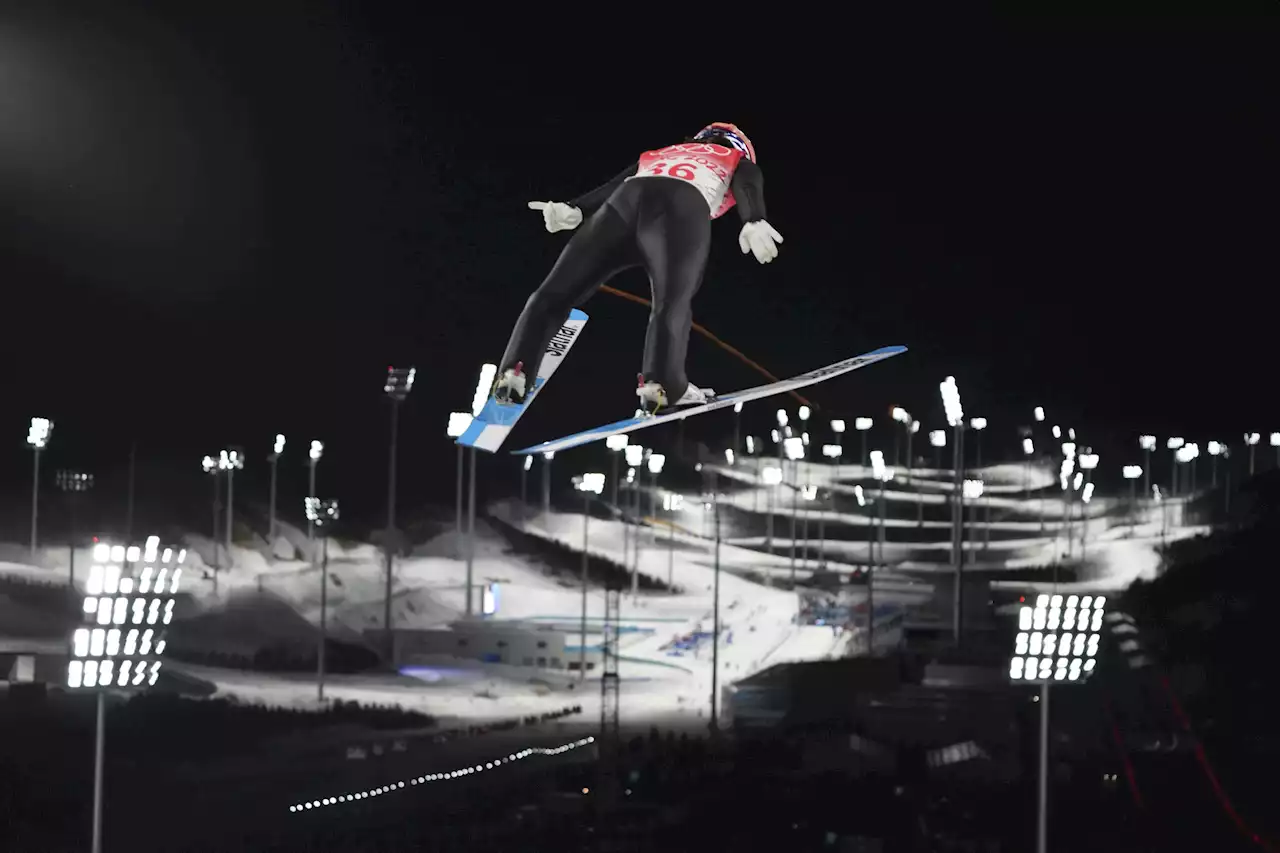 AP PHOTOS: Medals and more at Day 1 of the Beijing Olympics