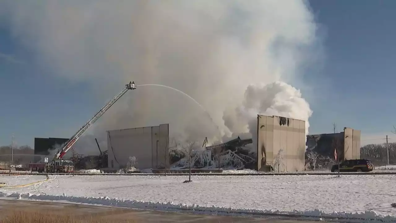 Massive warehouse fire in Bartlett continues to burn for second day