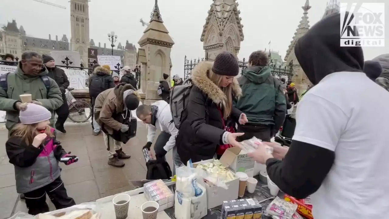 Supporters rally around Canadian trucker convoy providing food, gas and rides