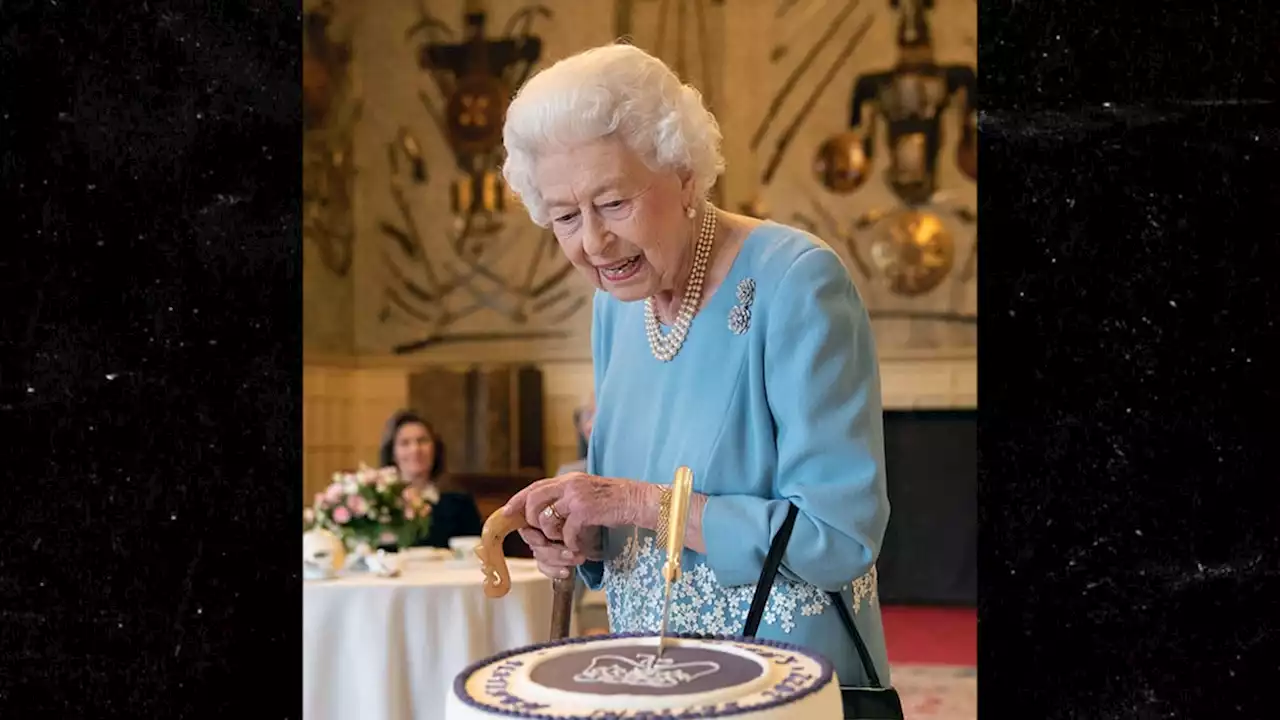 Queen Elizabeth II Jokes During Cake Cutting on Eve of Platinum Jubilee