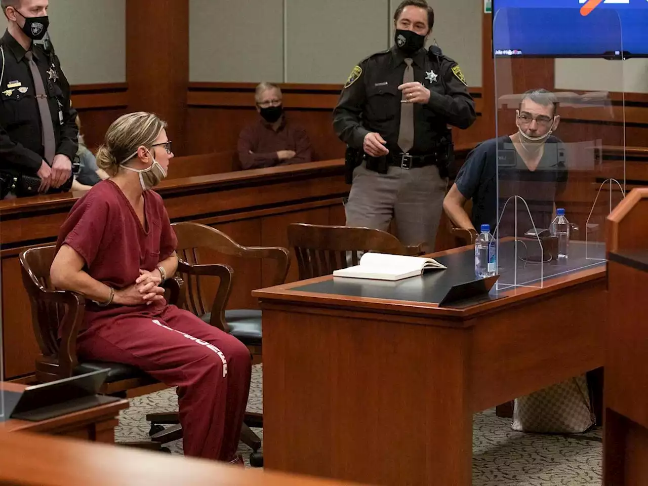 Prosecutors want the parents of the Michigan school shooting suspect to stop mouthing 'I love you' at each other in court