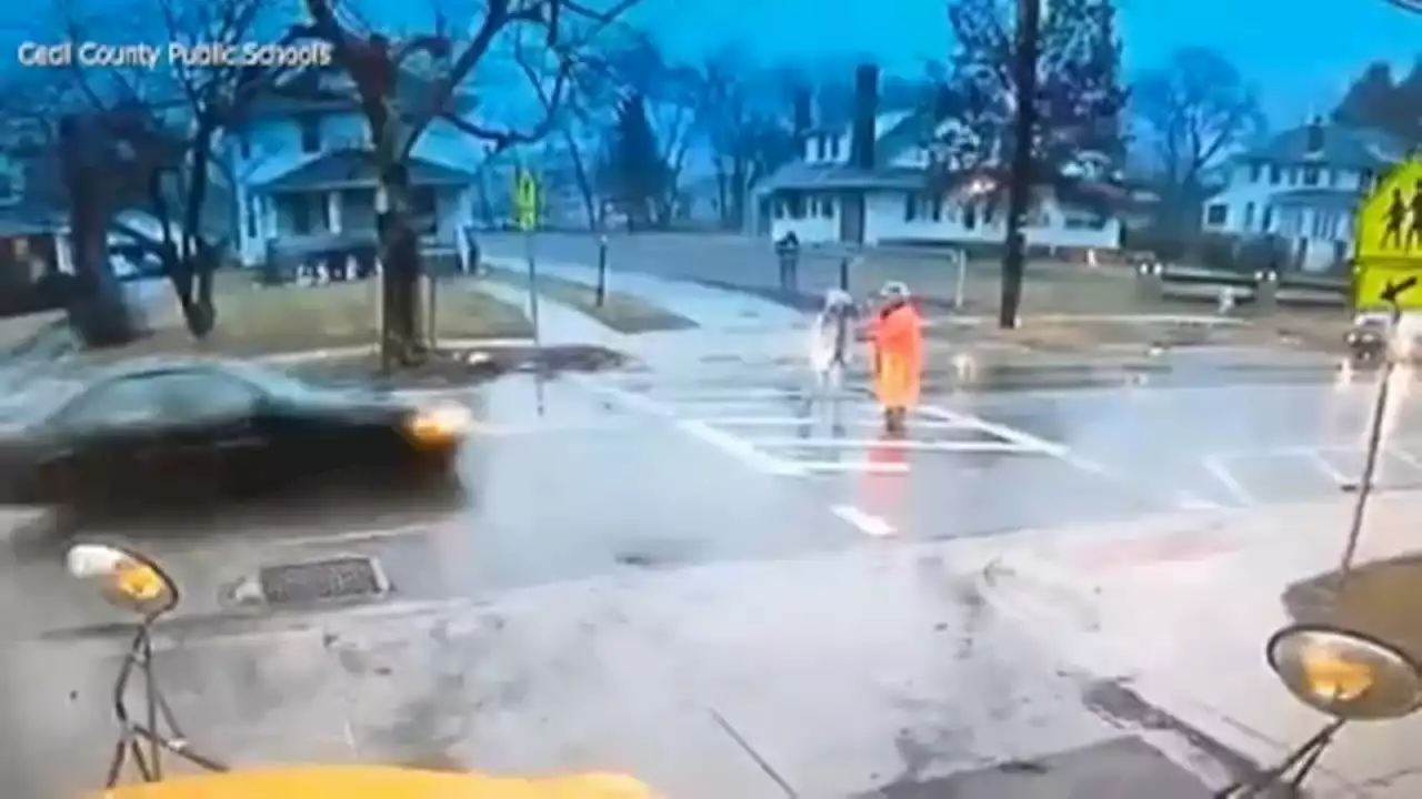 Crossing guard quickly saves student from car as driver ignores command in Maryland