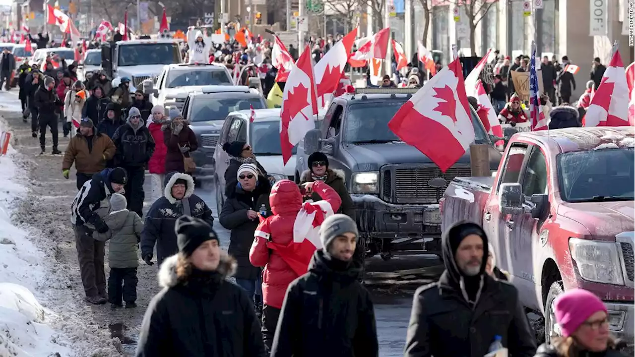 Crowds of demonstrators join rallies across Canada as Covid-19 trucker protests spread