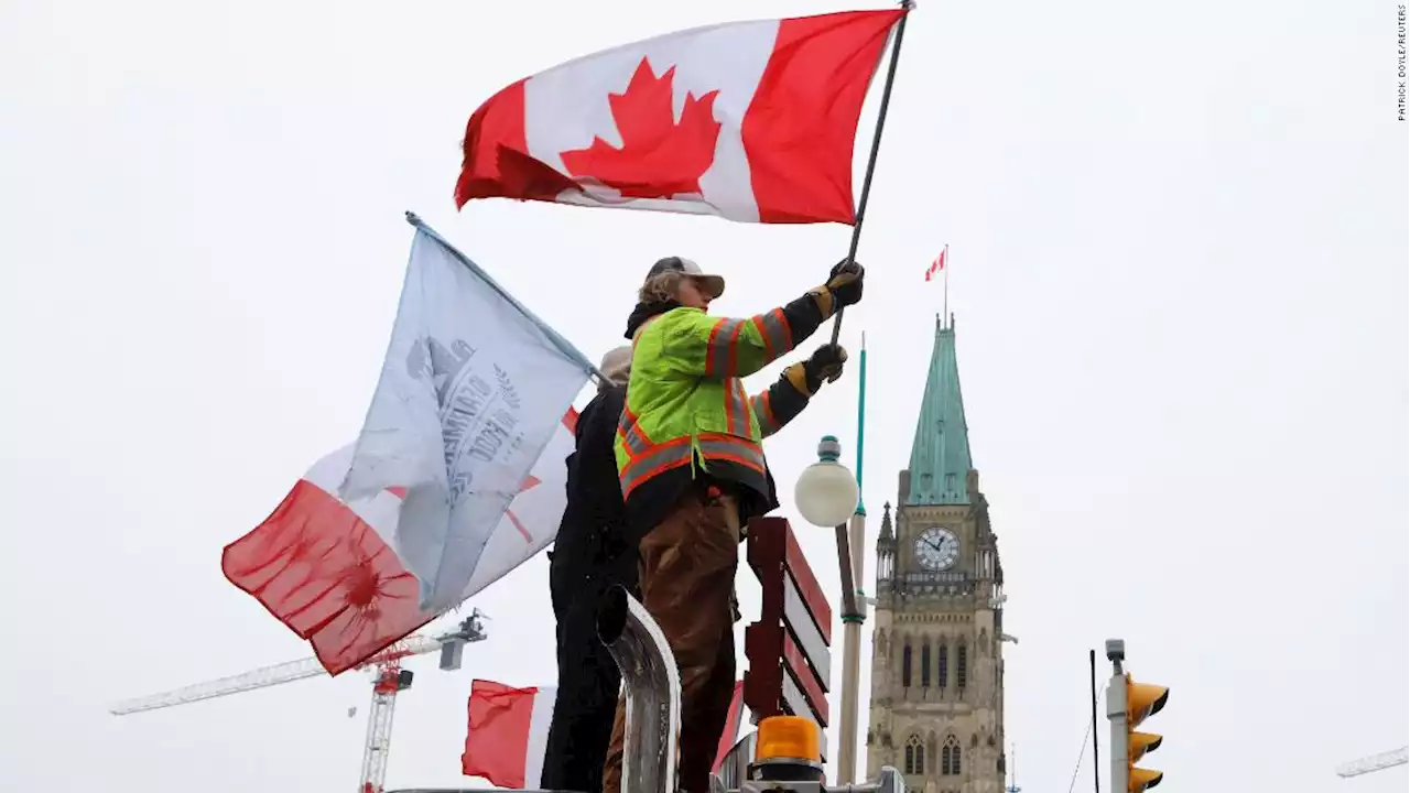 Thousands of Canadians continue to protest Covid-19 restrictions as officials announce multiple arrests