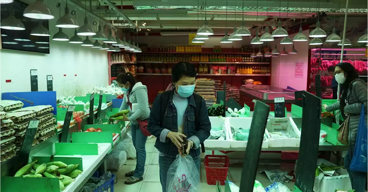 Hong Kong residents raid supermarket shelves as COVID surge disrupts supplies