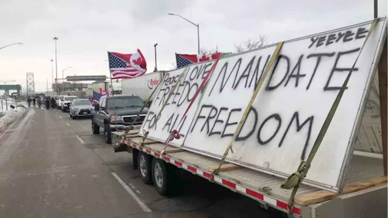 Protesters block Canada-bound traffic on Ambassador Bridge in Windsor | CBC News
