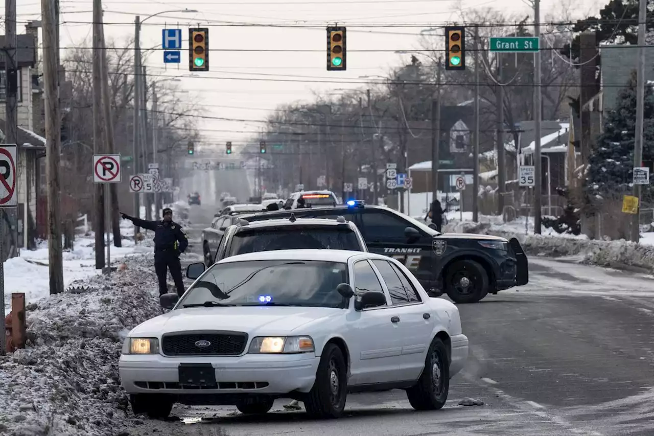 Veteran Gary officer shot after stopping to help motorists; one in custody, police say