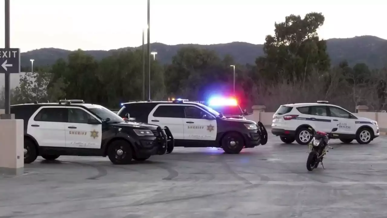 Woman on Motorcycle Killed in Fall From Third Level of Shopping Center Parking Structure