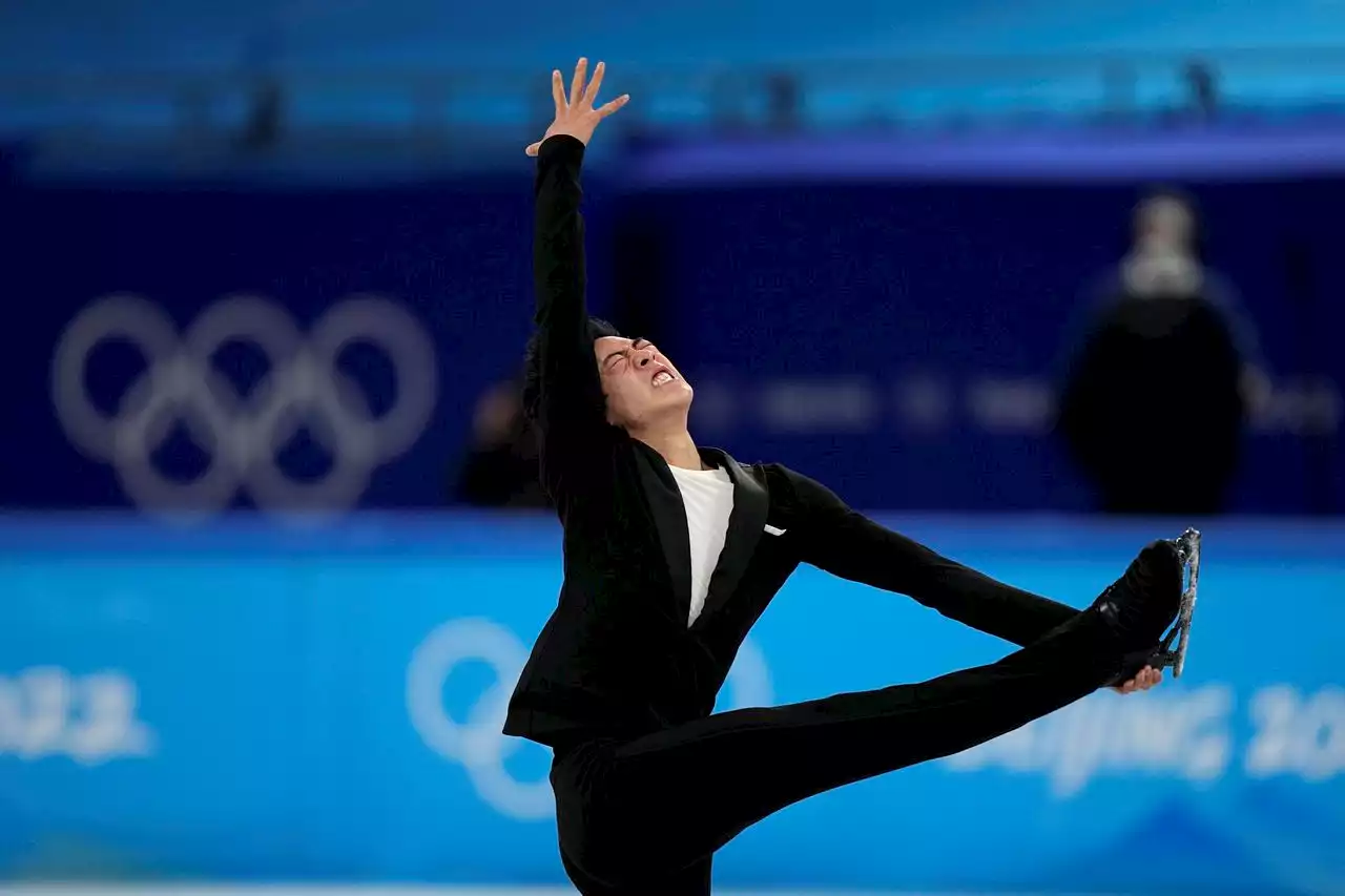 Winter Olympics: American Nathan Chen sets short program record