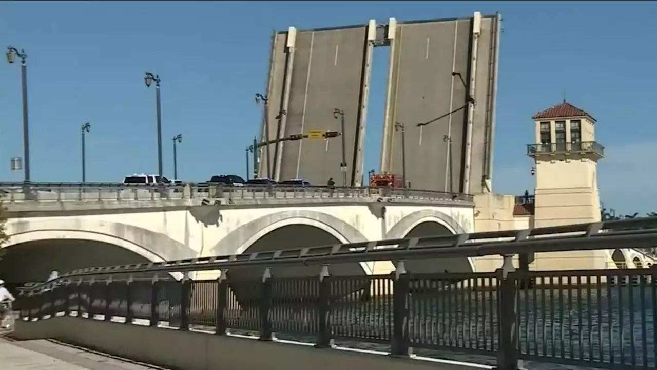 Women biking across drawbridge falls to death; bystander lost grip trying to pull her to safety