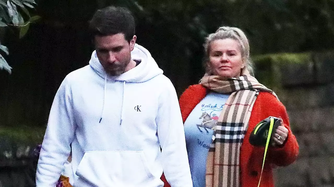 Kerry Katona takes new Rottweilers for a walk after terrifying robberies