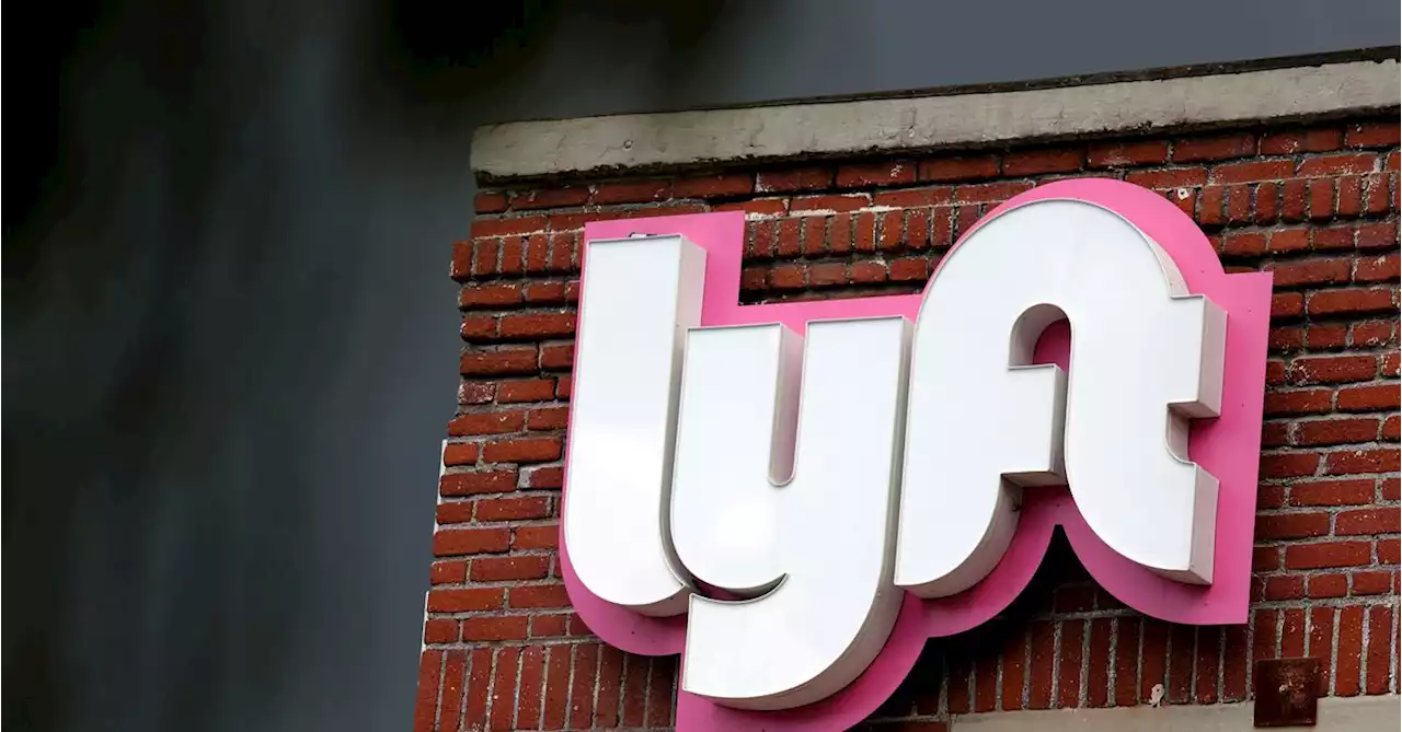 Lyft's weak rider numbers, Omicron hit outweigh first full-year profit