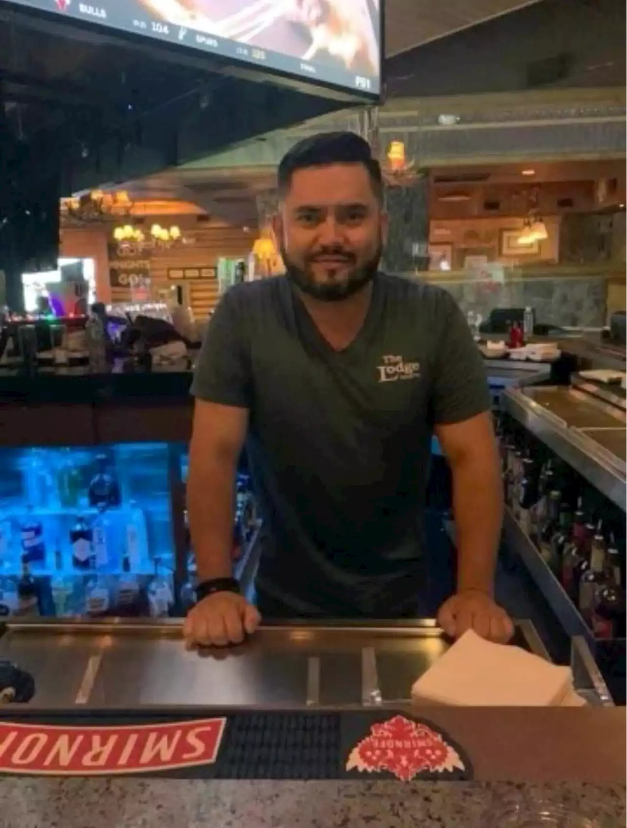 Las Vegas bartender robbed at gunpoint was forced to repay bosses stolen money, lawsuit says