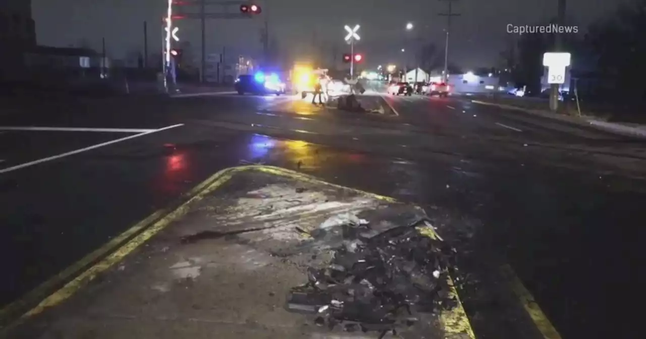 4 dead after car collides with freight train in Harvey