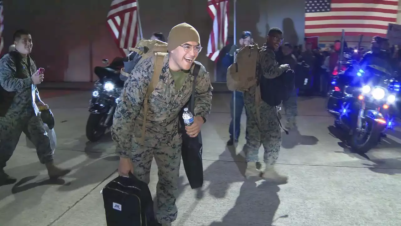 Families welcome home U.S. Marine Corps squadron at Fort Worth naval reserve base