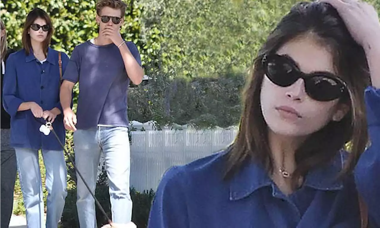 Kaia Gerber and beau Austin Butler take her dog on a walk in LA