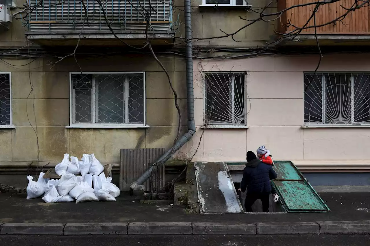 In photos: Civilians continue to flee Ukraine as Russia's invasion continues