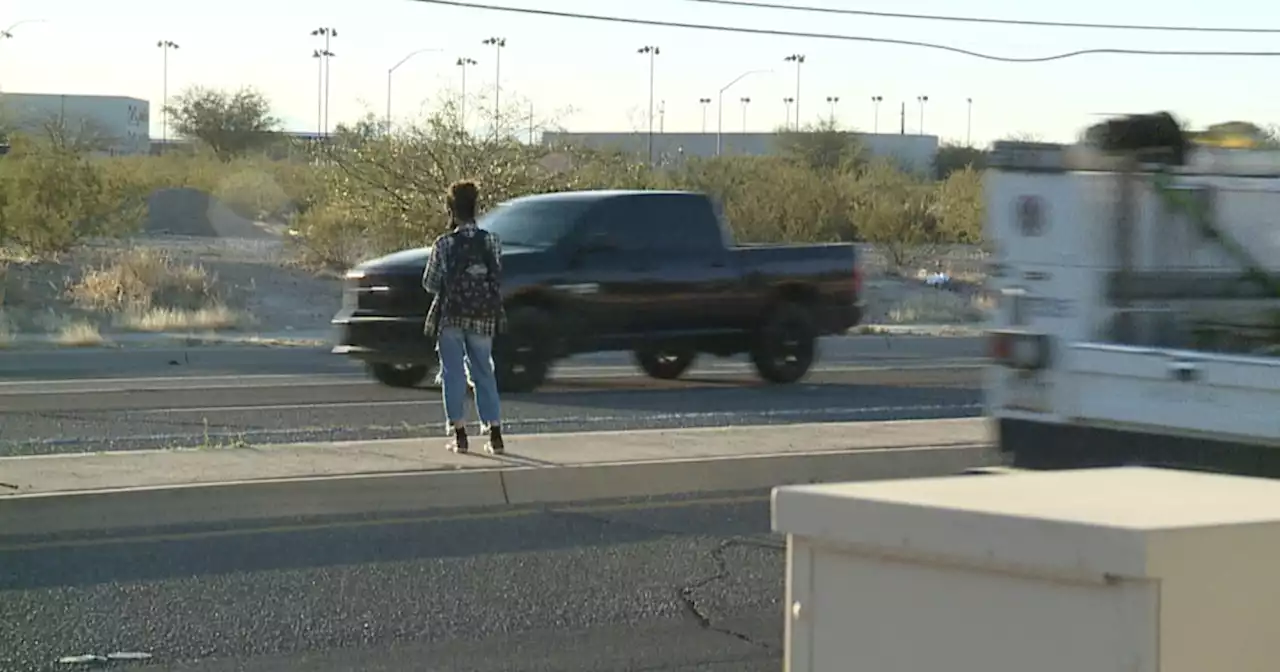 As students dodge traffic, a crosswalk is several steps away