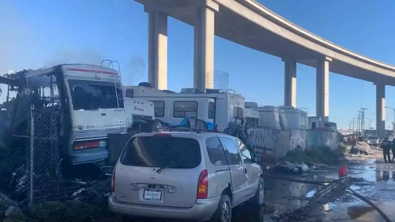 2 dogs perish in fire that consumes 3 RVs in Oakland lot, separate fire delays traffic