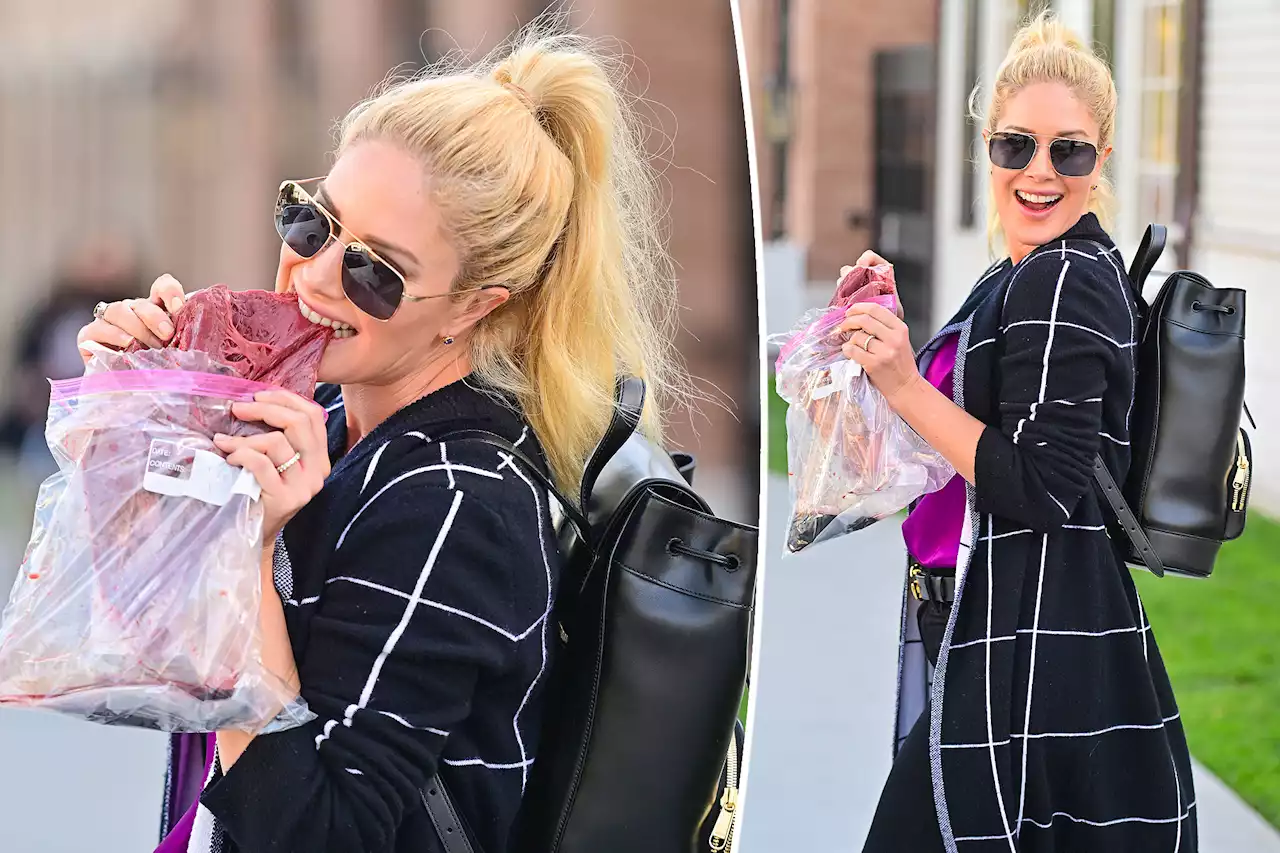 Heidi Montag snacks on bison heart as part of her raw meat diet