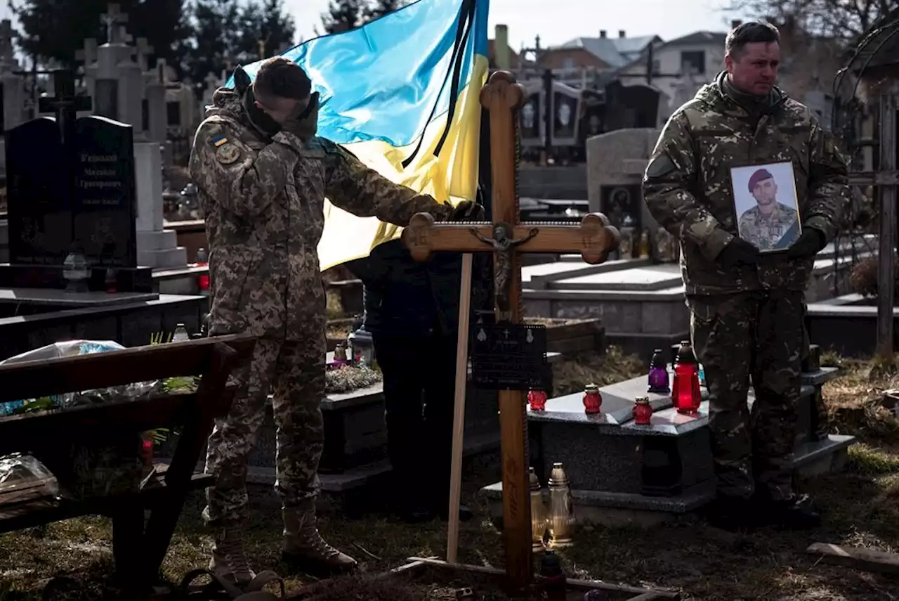 Besieged Ukrainian city of Mariupol buries soldiers and civilians in mass graves during Russian invasion