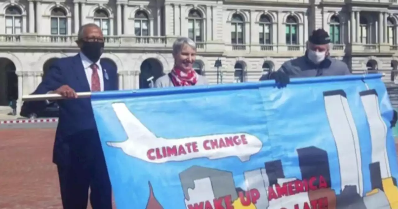 New York senators blasted for posing with banner evoking 9/11 at climate change rally